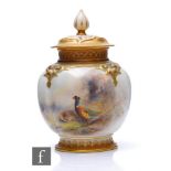 A Royal Worcester small pomander and cover, shape H278, the footed fluted ovoid body with relief