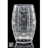 A mid 20th Century Stuart & Sons clear cut crystal glass vase, designed by John Luxton, of swollen