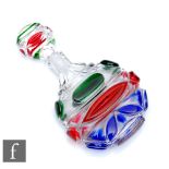 An early 19th Century Bohemian crystal scent bottle, the compressed circular body cased in blue, red
