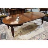 A 19th Century mahogany extending D-end dining table complete with single insert leaf, raised to