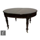 A 19th Century mahogany D-end extending dining table, complete with four insert leaves, raised to