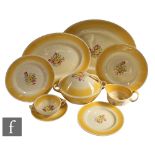 A Susie Cooper part dinner service, to include two meat plates, six side plates, six dinner
