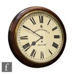 An early 20th Century mahogany cased wall clock with eight-day single fusee movement, the later