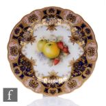 A Royal Worcester cabinet plate decorated by R. Sebright with hand painted apples and strawberries