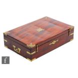 A 19th Century mahogany brass corner mounted box, possibly a pistol case, lacking interior fittings,