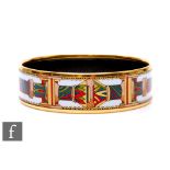 A Hermes enamelled stiff bangle decorated with Corinthian columns to a white ground, internal