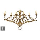 An early 20th Century seven gilt branch wall sconce, 72cm x 104cm.