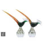 A pair of 20th Century Murano glass figures, modelled as stylised birds with elongated tails,