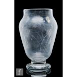 An early 20th Century Thomas Webb & Sons clear crystal glass vase of footed shouldered ovoid form
