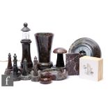 A collection of 20th Century serpentine ware to include light house models, one converted to