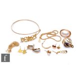 A small parcel lot of 9ct gold and yellow metal items to include earrings, chains etc, weight of 9ct