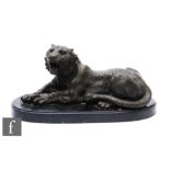 A 20th Century bronze study of a recumbent snarling tiger, on oval plinth base, width 36cm.