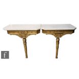 Amended description - A pair of late 19th Century gilt consul tables, each mounted