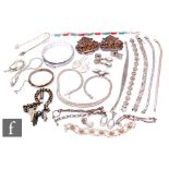 A small parcel lot of assorted silver and white metal jewellery to include bangles, chains, earrings