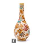 A late 19th Century continental bottle vase, possibly Harrach, in the Aesthetic taste, the ivory
