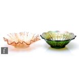 Two early 20th Century Carnival glass bowls with wave edged rims, by Millersburg, the first relief