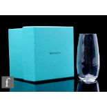 A set of ten Tiffany & Co stemless champagne flutes of plain tapered form, complete with all
