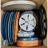 A collection of plastic empty film reels, sizes vary, also six metal boxes, largest diameter