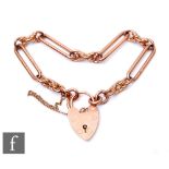 A 9ct rose gold fetter and dog link bracelet, weight 20g, terminating in padlock fastener.