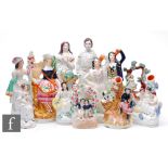 A collection of 19th Century Staffordshire flat backs, to include figures, spill vases and arbour