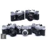 A collection of USSR cameras, to include three Zenit-B, a Zenit-EM and a Zenit-3M. (5)