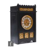 A late 19th Century Aesthetic period ebonised cased mantle clock by Saml.Marti & Cie Paris, circular