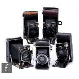 A collection of various folding bellows cameras, to include a Welta Perle f.2.9 75cm lens, Butcher’s