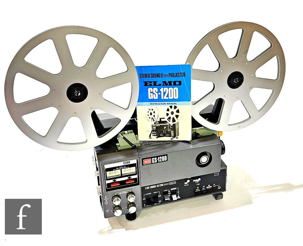 An ELMO GS 1200 Stereo Sound Film Projector, with f/12.5mm-30mm lens, together with the