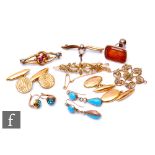 A small parcel lot of assorted 19th Century jewellery to include a pair of 15ct earrings, three