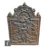A 19th Century cast iron fireback bearing the date 1679 depicting a Romanesque female under PAX