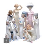 A group of 20th Century Spanish ceramic figures to include ladies in period dress and clowns,