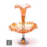 An early 20th Century carnival glass epergne by Brockwitz in the Sunspray pattern, metal foot rising