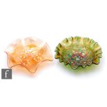 Two early 20th Century Carnival glass bowls by Millersburg, the first relief moulded to the