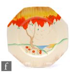 A Clarice Cliff Octogonal plate circa 1936, hand painted in the Taormina (Orange) pattern with a