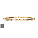 A modern 18ct fancy link bracelet comprising fourteen alternating white and matt gold shaped panels,