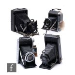 A collection of Ensign folding cameras to include Ensign selfix 12-20, Ensign 220 Selfix, Houghton