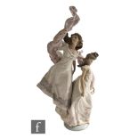 A large Lladro figure group titled 'Allegory of Liberty', modelled as two ladies dancing with