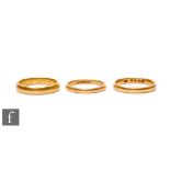Three 22ct hallmarked D shaped wedding rings, total weight 13.3g, various dates and sizes. (3)