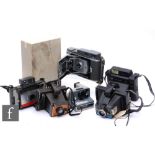 A collection of Polaroid and further instant cameras, to include a boxed model 150 land camera,