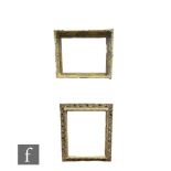 An early 19th Century gilt and gesso picture frame decorated with floral swags and gilded mesh to