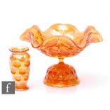 Two pieces of early 20th Century carnival glass, a fruit bowl and stand by Brockwitz, glued