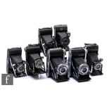 A collection of Ensign folding cameras, to include a Greyhound with Synchro A shutter, two Ranger