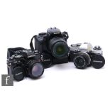 A collection of 35mm SLR cameras, to include Canon EOS 400D digital 3.5 - 5.6 f58mm lens, a Chinon