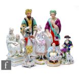 A pair of 19th Century French Paris Porcelain figures modelled as a Sultan and Sultana in robes