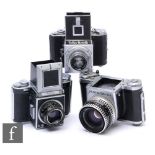 A collection of medium format cameras, to include a Pentacon Six (lacking metering prism), an Agilux