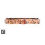 A 9ct hallmarked tri-coloured brick link bracelet, weight 18.5g, length 18cm, terminating in fold