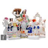 A collection of 19th Century Staffordshire flat backs, to include figural pair groups, clock