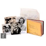 A 1950s/60s autograph album including Stan Laurel and Oliver Hardy, Jimmy Edwards, Kalanag and