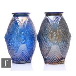 A pair of early 20th Century carnival glass vases of ovoid form by Libochovice, each relief