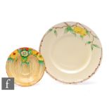 A large Clarice Cliff circular plate circa 1937, hand painted to the shoulder in the Lemons